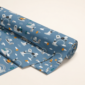Shop blue construction cotton fabric with tractors, diggers, rainbows and balloons. 100% cotton, ideal for nursery bedding, curtains and sewing projects.