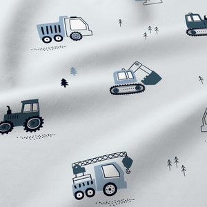 Close-up of blue trucks and diggers cotton fitted sheet
