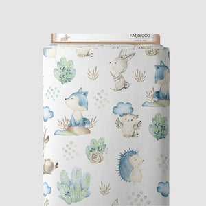 Cotton fabric with a whimsical woodland print featuring hedgehogs, foxes, owls, and forest elements on a soft, breathable material, perfect for quilting, crafts, and home décor.