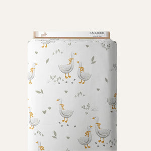 Fabric roll with goose pattern and 'FABRICCO' branding on a white background
