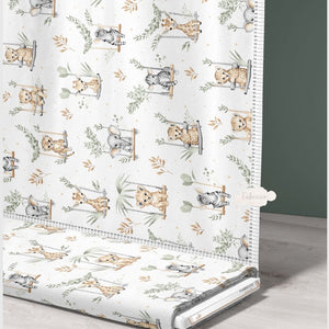 ute Safari Animals sage green cotton fabric on a roll from Fabricco UK, 160 cm wide, showing the horizontal safari print.