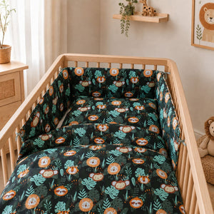 Jungle animals cot bedding set with decorative cot bumper in modern wooden cot Uk Fabricco