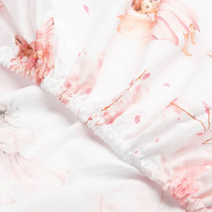 Pink Fairy Fitted Sheets, perfect for your little princess's cot or cot bed in various sizes. Crafted from pure cotton, it adds a whimsical touch to her baby pink nursery, featuring delightful fairies and blossoming flowers.