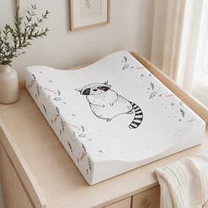 Raccoon anti-roll baby changing mat styled on a neutral nursery dresser with Scandinavian décor UK Fabricco