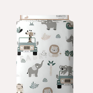 Safari Adventure sage green cotton fabric with jungle animals and jeeps for nursery sewing and children's projects . UK Fabric shop