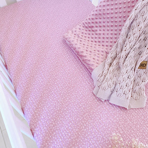 Seersucker 100% cotton fitted sheet in delicate meadow flower print on a dusty pink