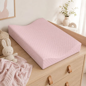 Soft pink baby girl anti-roll changing mat styled in a Scandinavian nursery Fabricco UK