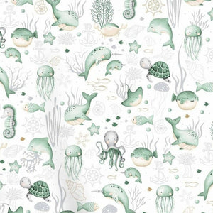 Under the Sea mint green cotton fabric by the metre from Fabricco UK with whales, turtles, octopus and sea life for nursery sewing.