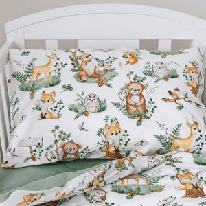 Welcome your little explorer to the woodland! This charming bedding set features adorable forest creatures in soothing sage green and warm brown tones