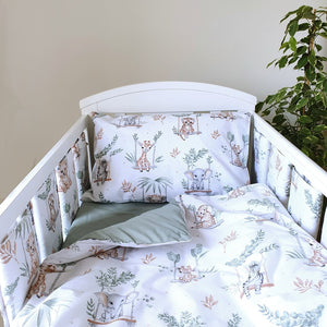 Add a touch of jungle fun to your baby’s cot with our Sage Green Safari Adventure Bedding Set. Featuring playful giraffes, zebras, and lions in soft sage green and beige tones, this reversible set offers a calming sage green reverse.