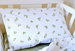 Green Leaves Baby Bedding Set - the perfect addition to your little one's nursery! This adorable set features a delicate leaf design on both sides and is made from pure cotton for ultimate comfort and coziness. Transform your nursery into a tropical paradise with ease!