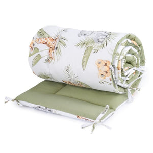 Cute Jungle Friends reversible cot bed bumper with safari animal print and sage green reverse, 30 × 210 cm, handmade in the UK.