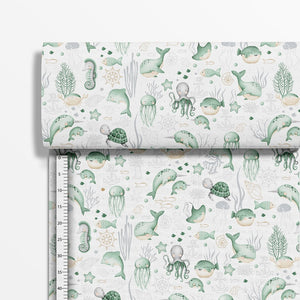 This cute Cotton Fabric - Under the Sea in mint green features a delightful sea creature design that's perfect for kids' crafts