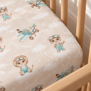 Close-up of Safari Pilots cotton fitted sheet showing mint aeroplanes, animal pilots and the fitted mattress corner
