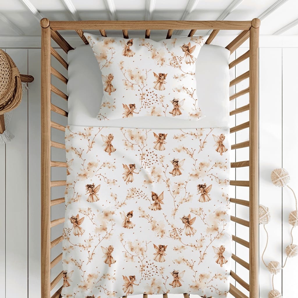 the Little Fairy Bedding Set for your little girl! This charming set comes in two sizes: cot and toddler cot bed. The design features natural tones that will make your baby&#39;s room feel cozy and inviting.