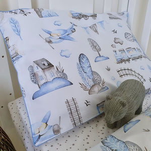 Train or plane, this Boy's Bedding Set has you covered! Handmade with love, this set is the perfect finishing touch for any train-themed bedroom. The watercolour design and baby blue piping trim will have your little traveller dreaming of wild adventures. All aboard!