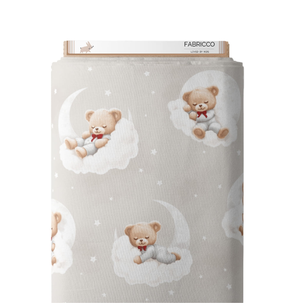Warm beige teddy bear cotton fabric with sleepy bears on clouds, ideal for neutral nursery décor, quilting, cot bedding and baby accessories.