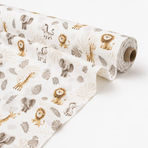 Beige safari animals cotton fabric by the metre with lions, elephants, giraffes, zebras and jungle leaves, fabric shop uk, Fabricco