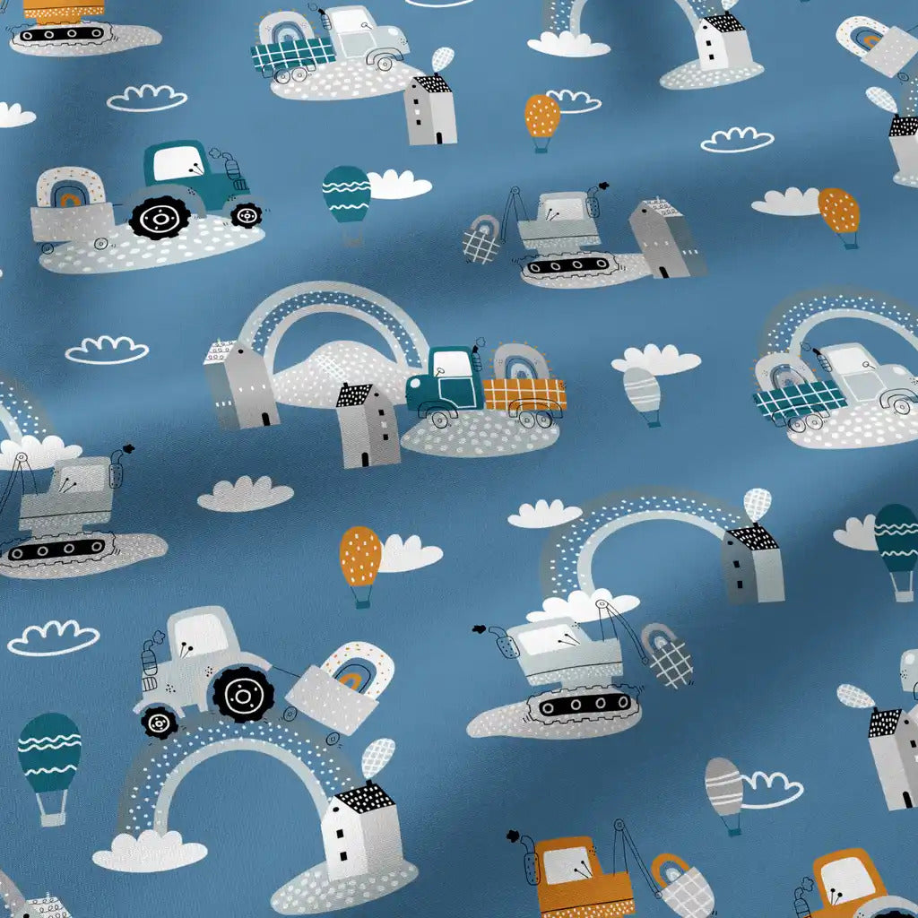 Shop blue construction cotton fabric with tractors, diggers, rainbows and balloons. 100% cotton, ideal for nursery bedding, curtains and sewing projects.