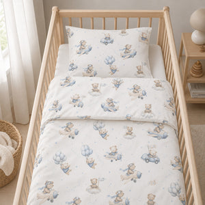 Close-up of blue teddy bear aviation cot bedding with bear pilots, aeroplanes, cars, balloons and clouds on soft cotton fabric., Fabricco