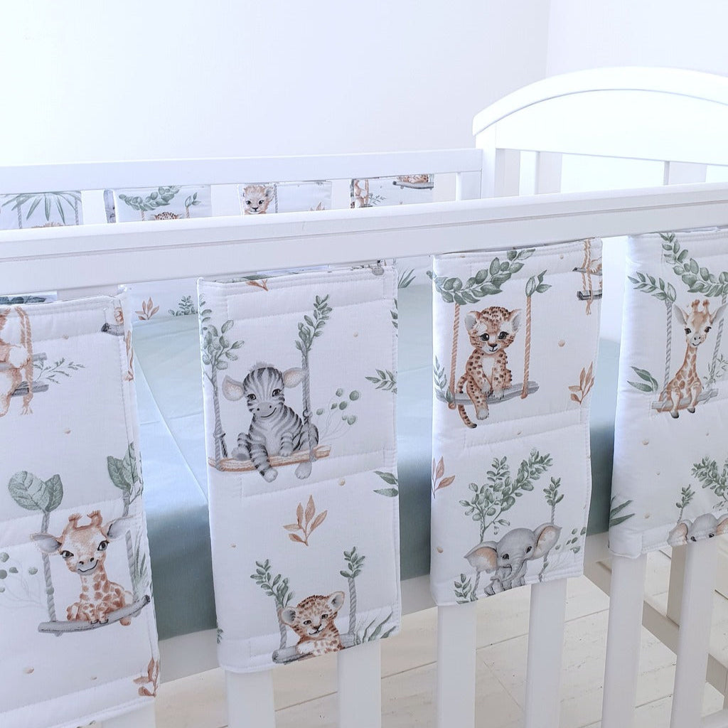 Keep your little one safe and cosy with our Cot Bed Padded Wraps Bumper. Made from soft 100% cotton with light polyester padding, these breathable wraps protect against bumps while ensuring optimal airflow.