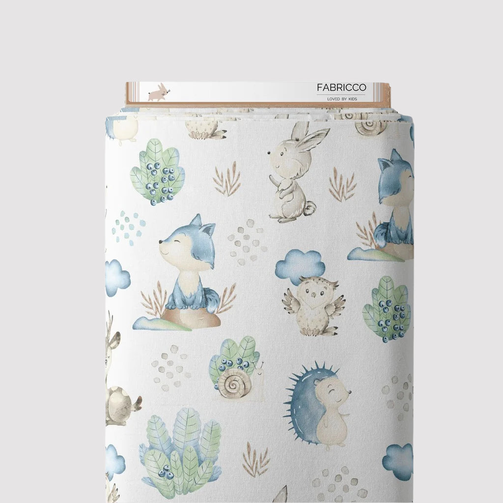 Cotton fabric with a whimsical woodland print featuring hedgehogs, foxes, owls, and forest elements on a soft, breathable material, perfect for quilting, crafts, and home décor.