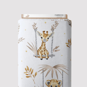 Cute Safari Animals beige cotton fabric by the metre from Fabricco UK with warm neutral jungle animal print for nursery sewing.
