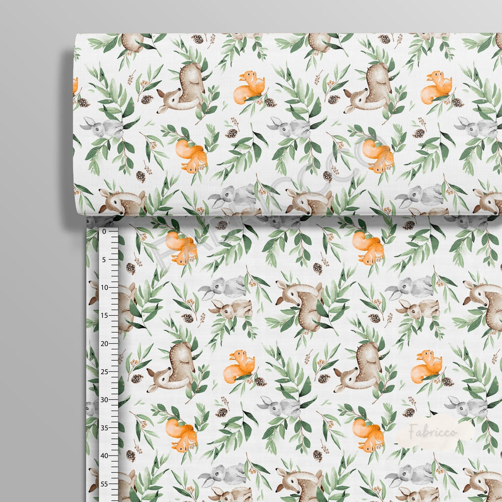 Forest Friends green cotton fabric on a roll from Fabricco UK, 160 cm wide, showing the horizontal woodland animal pattern.