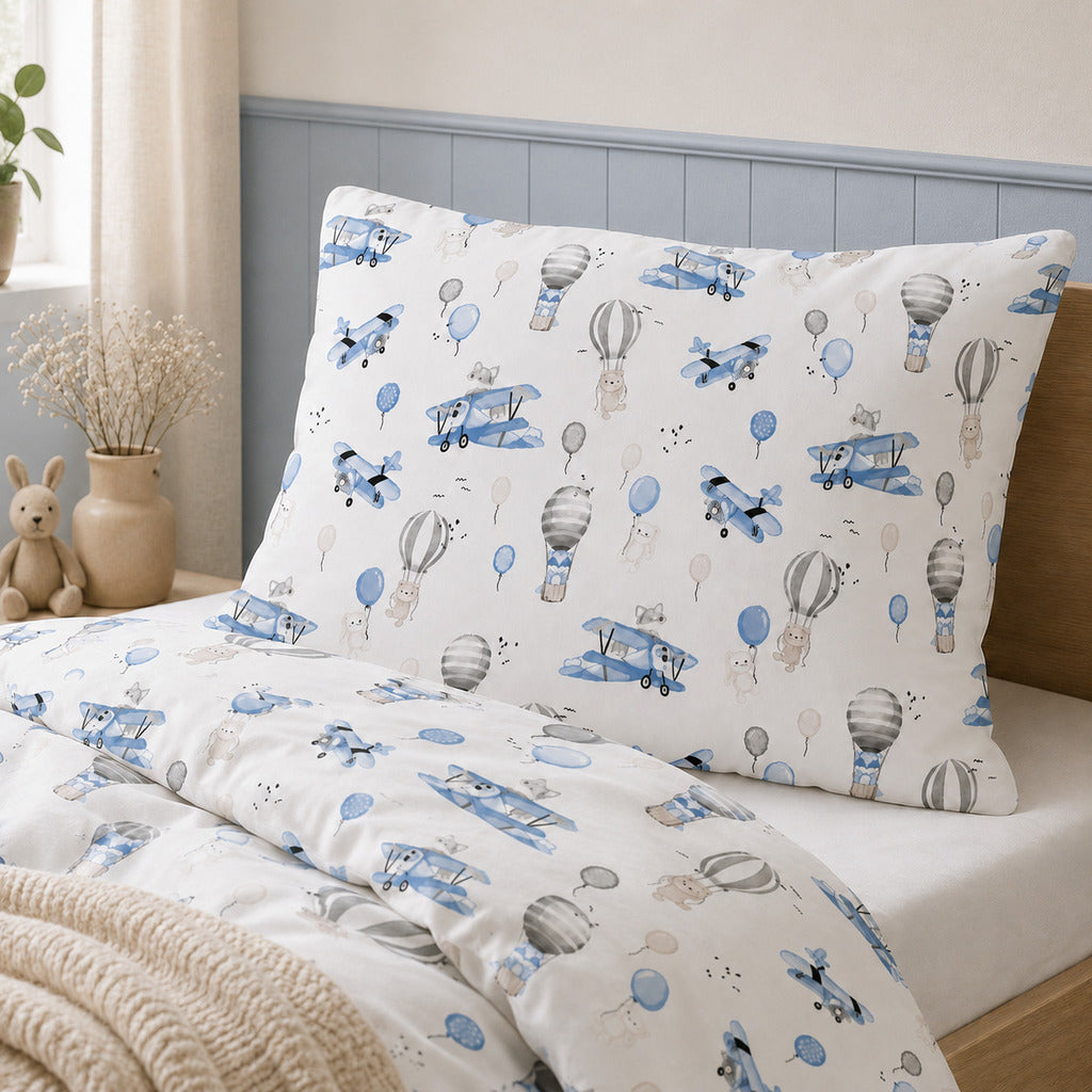 Blue hot air balloons and aeroplanes single bedding set for children, made from 100% OEKO-TEX cotton in the UK.