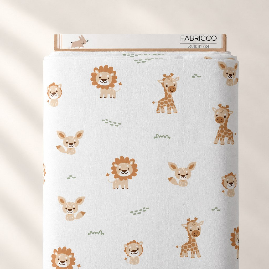 Little Safari Animals cotton fabric on a Fabricco bolt, showing beige and brown animals with muted green details