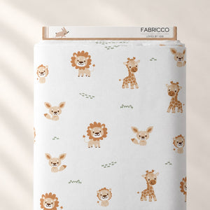 Little Safari Animals cotton fabric on a Fabricco bolt, showing beige and brown animals with muted green details