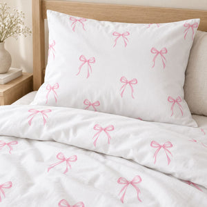 Pink bow single bed bedding set with duvet cover and pillowcase, handmade in the UK from OEKO-TEX cotton