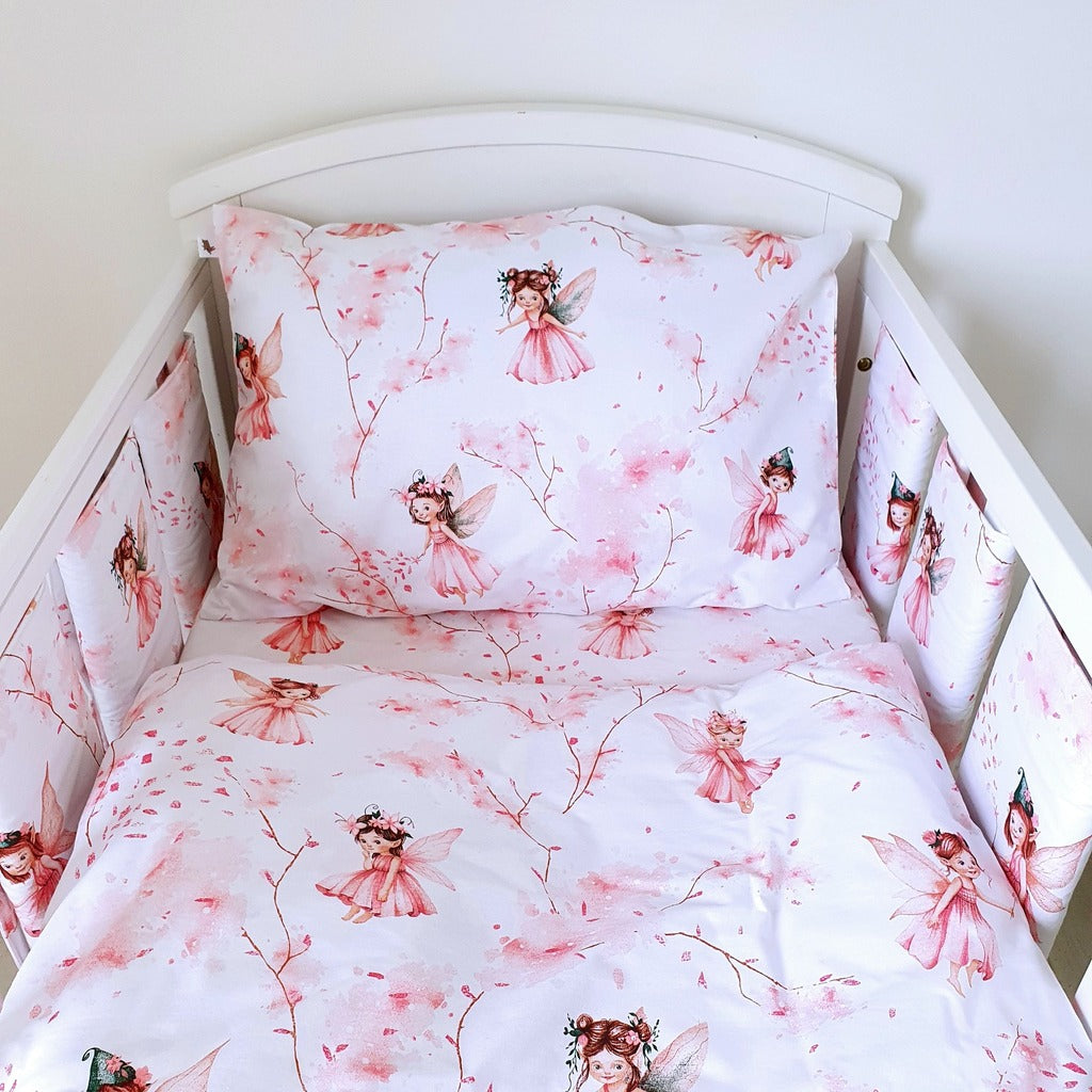 Pink Little Fairy Bedding Set with Cot Wraps – A charming baby bedding set featuring fairies and flowers in soft pastel pink, designed for cots and cot beds
