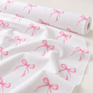 Pink bow 100% cotton fabric by the metre UK
