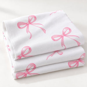 Pink bow 100% cotton fabric by the metre