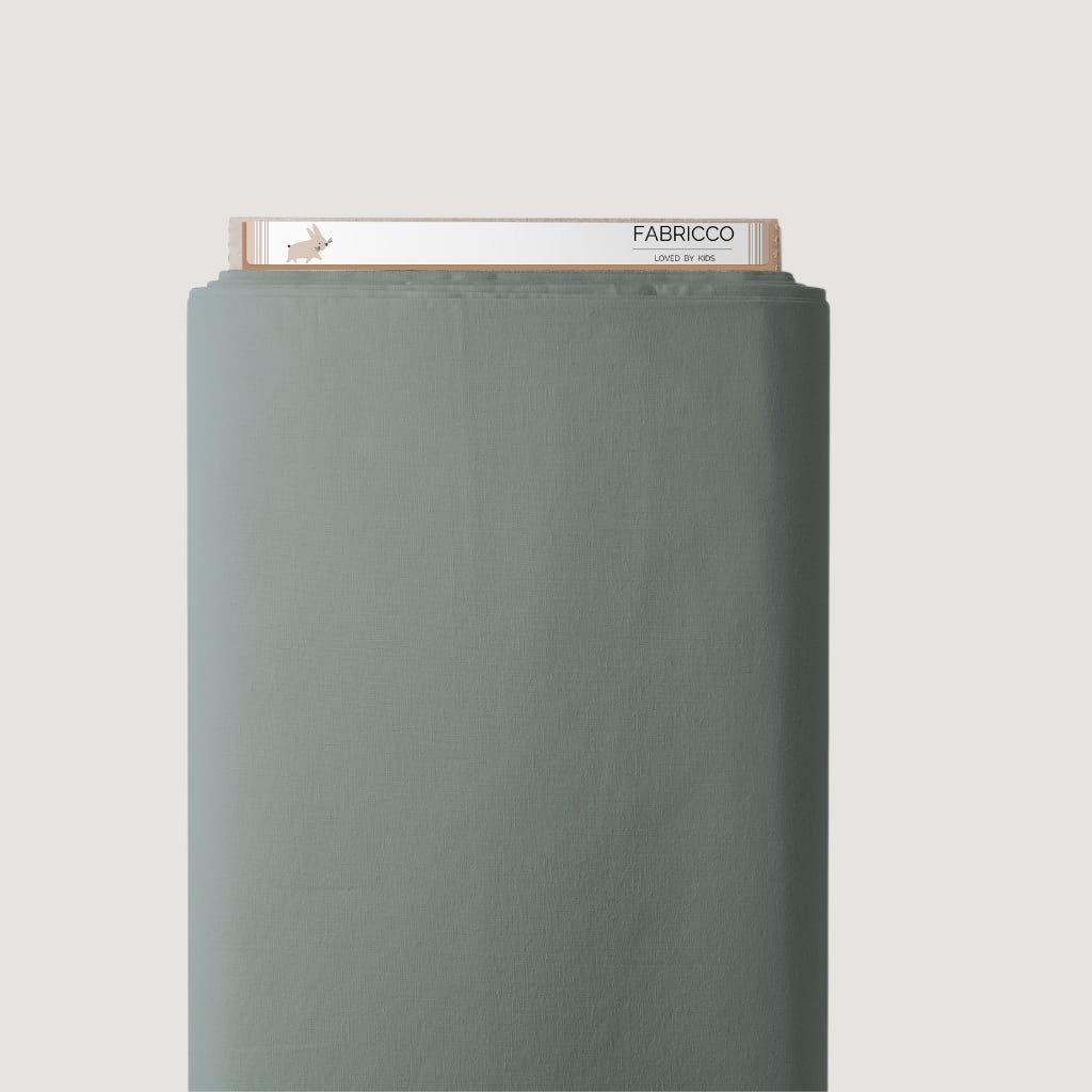 Plain sage green 100% cotton fabric for nursery bedding, children’s sewing and craft projects
