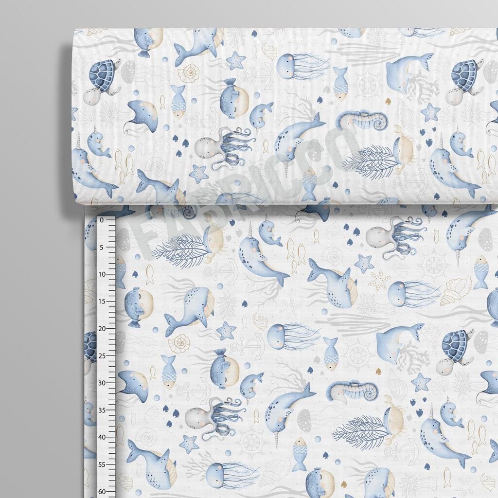 Sea Life cotton fabric on a roll from Fabricco UK, 160 cm wide, showing the horizontal ocean print.
