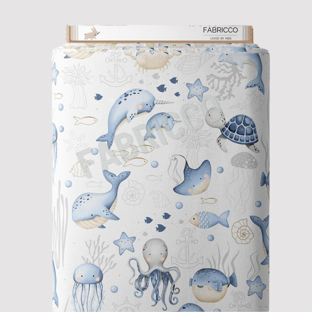 Sea Life cotton fabric by the metre from Fabricco UK with ocean animals in mint green and blue for nursery sewing.