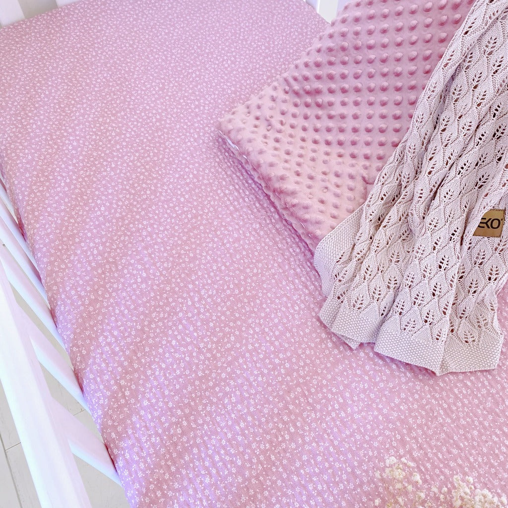 Seersucker 100% cotton fitted sheet in delicate meadow flower print on a dusty pink