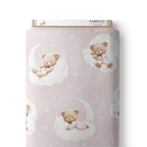 Soft pink teddy bear cotton fabric with clouds, moons and stars, perfect for baby nursery décor, cot sheets and children’s sewing projects.