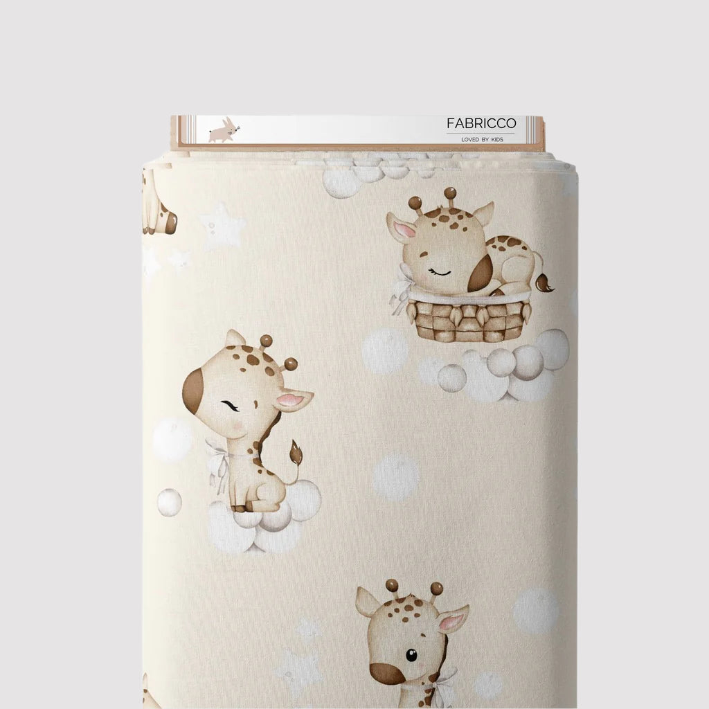 Sweet giraffe print cotton fabric on beige background – 100% cotton, perfect for baby nursery or kids' sewing projects."
