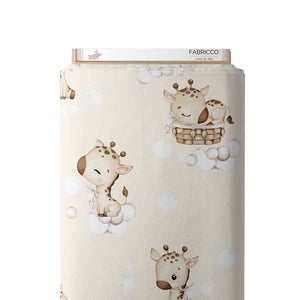 Sweet giraffe print cotton fabric on beige background – 100% cotton, perfect for baby nursery or kids' sewing projects."