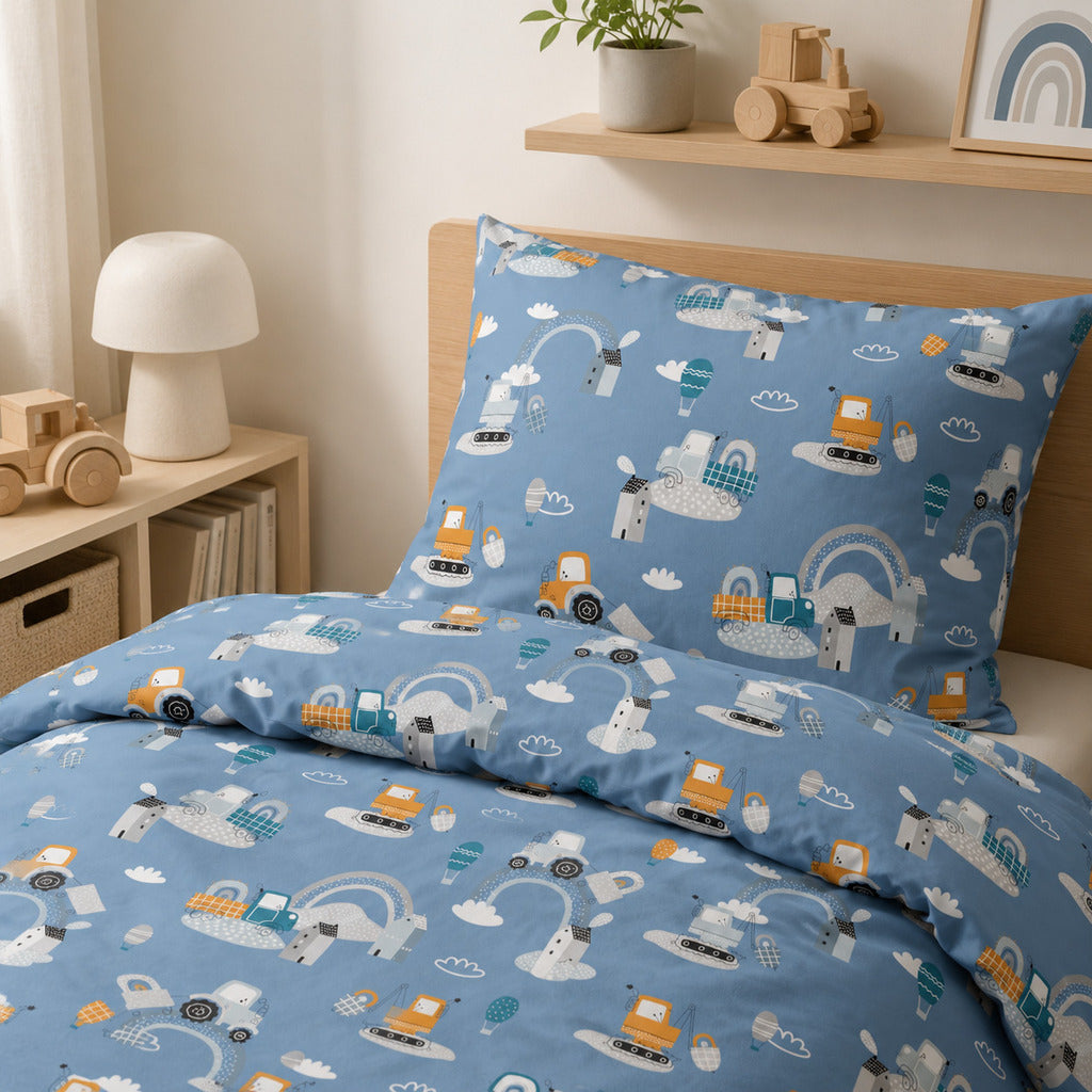 Kids’ blue single bedding set with tractors, diggers, hot air balloons and rainbows on a standard UK single bed.