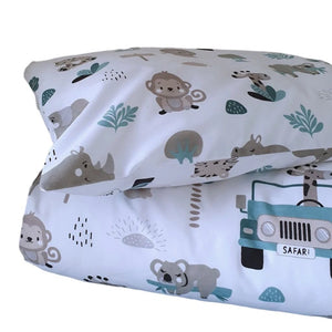 Transform your baby’s cot into a jungle adventure with our Sage Safari Adventure bedding set. Featuring cheerful elephants, playful monkeys, and a safari jeep, all in calming sage green, grey, and a hint of black, this set is perfect for little explorers.  Made from soft, pure cotton, both the duvet cover and pillowcase showcase the fun safari theme on both sides. It’s a wonderful way to make your baby’s sleep space both cosy and exciting.