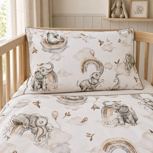  elephant cot duvet cover showing narrow grey piping and matching watercolour elephant, rainbow and cloud print on both sides.