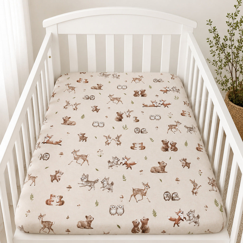 Woodland animals baby fitted sheet with deer, foxes, bears, rabbits and owls on soft cotton cot bed sheet in white nursery cot
