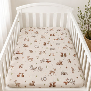Woodland animals baby fitted sheet with deer, foxes, bears, rabbits and owls on soft cotton cot bed sheet in white nursery cot