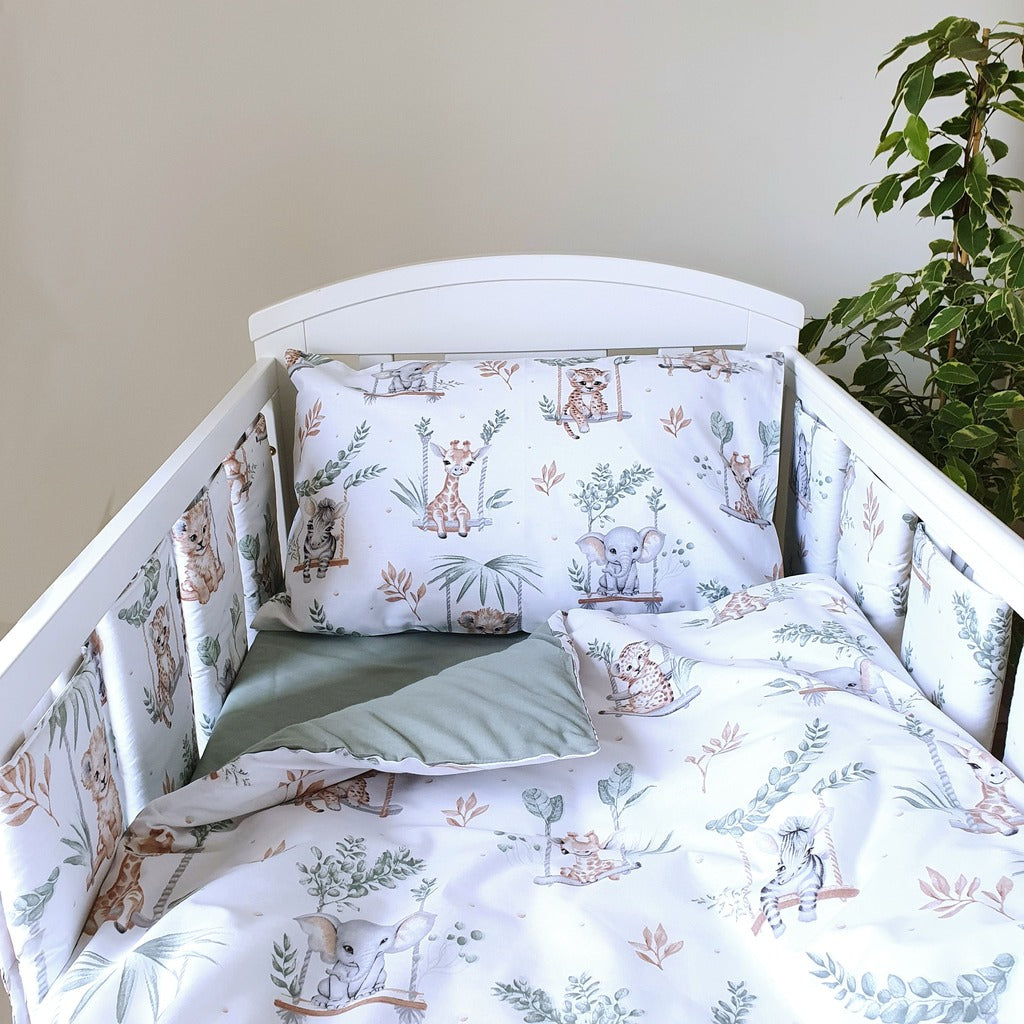 Add a touch of jungle fun to your baby’s cot with our Sage Green Safari Adventure Bedding Set. Featuring playful giraffes, zebras, and lions in soft sage green and beige tones, this reversible set offers a calming sage green reverse.