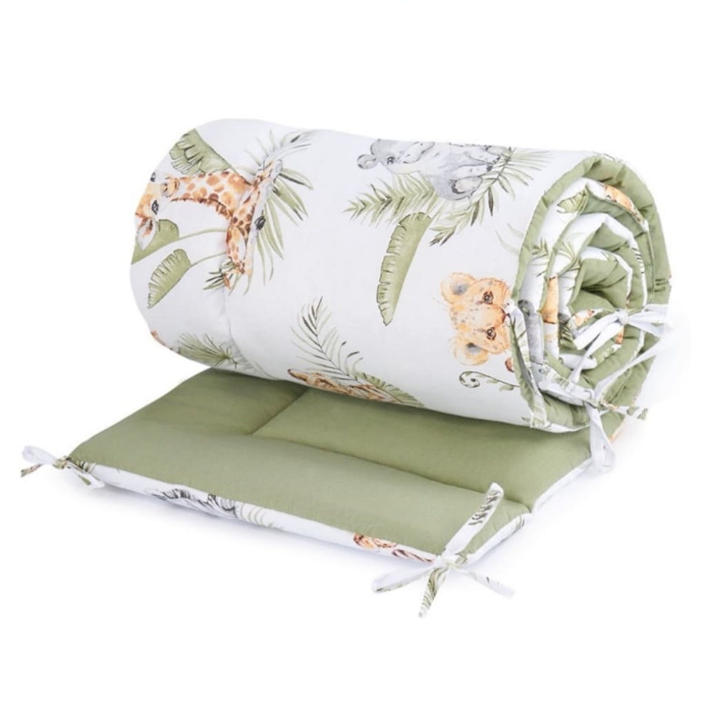 Cute Jungle Friends reversible cot bed bumper with safari animal print and sage green reverse, 30 × 210 cm, handmade in the UK.