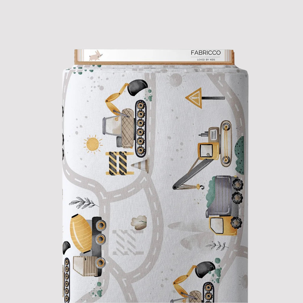 Diggers cotton fabric featuring an under-construction design with diggers, trucks, and building elements in earthy natural tones. Ideal for children&#39;s clothing, bedding, or nursery décor projects. Soft, durable, and breathable, this 100% cotton fabric is perfect for sewing enthusiasts.